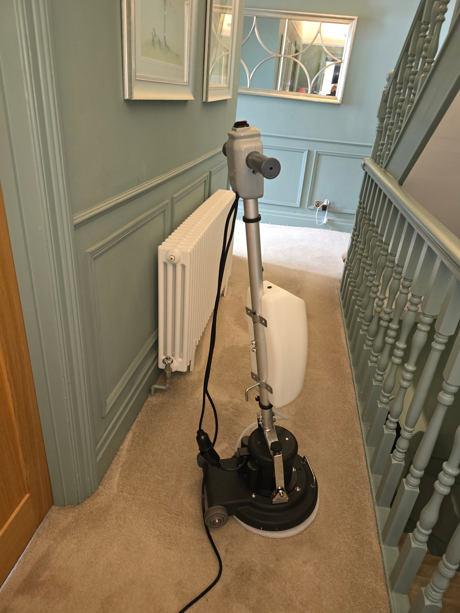 Low-moisture carpet cleaning machine in the upstairs hallway at Dyneley Hall, Bramhope