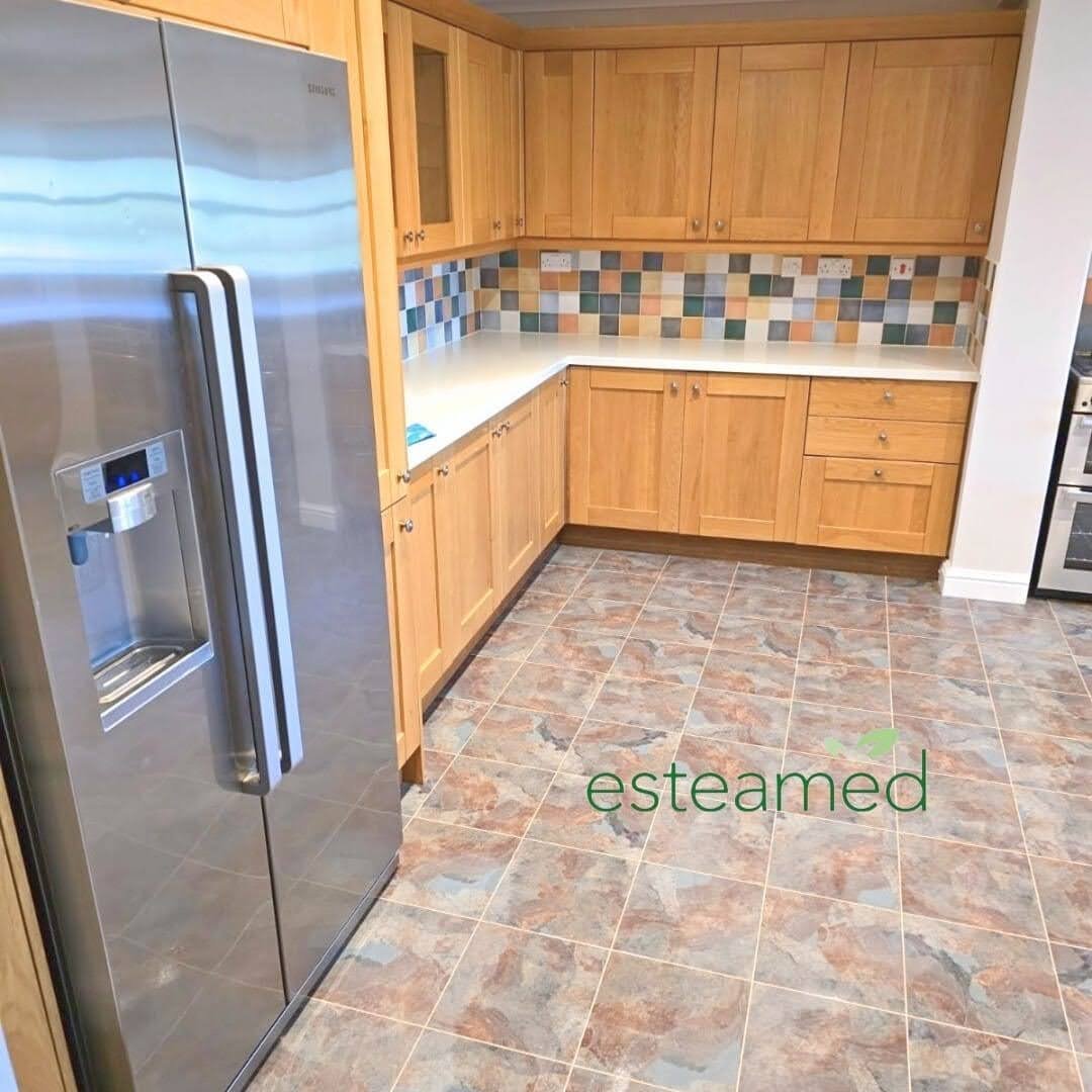 End of tenancy kitchen deep clean — degreased hob, clean cupboards and mopped floors
