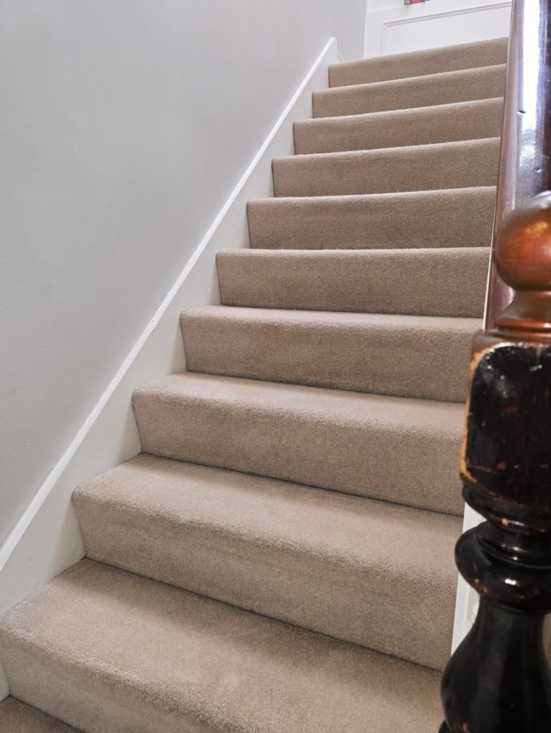 Freshly cleaned beige carpeted staircase in a Harrogate home