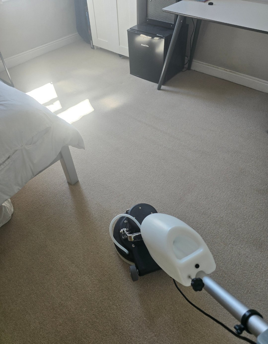 Professional CRB carpet cleaning machine at work in a Harrogate bedroom