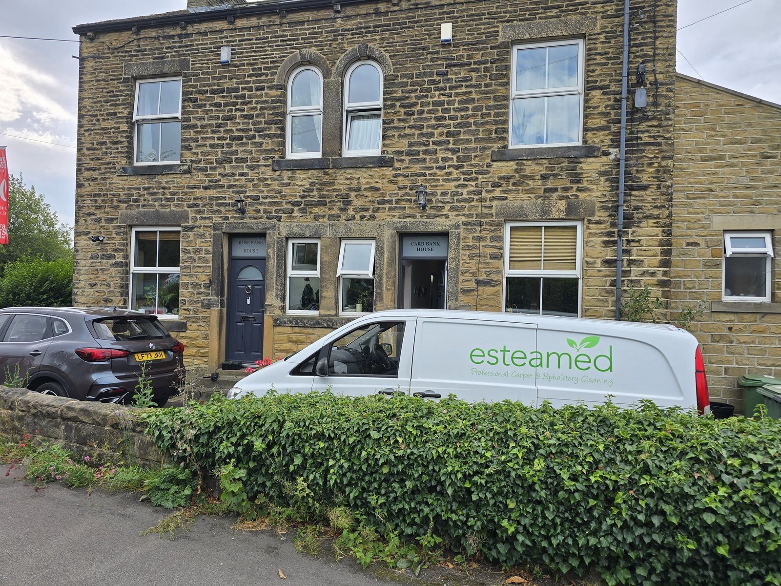 Esteamed professional carpet cleaning van at a job in Otley, West Yorkshire