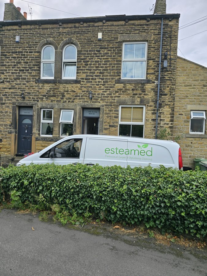 Esteamed branded van at an Otley stone property